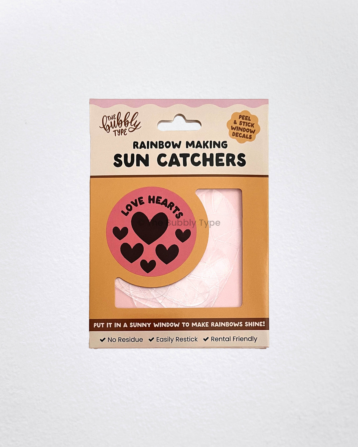 The Bubbly Type love heart sun catchers packaging, eco-friendly Australian made rainbow maker decals in heart shapes, perfect for Valentineโs gifts or kidsโ window decor.
