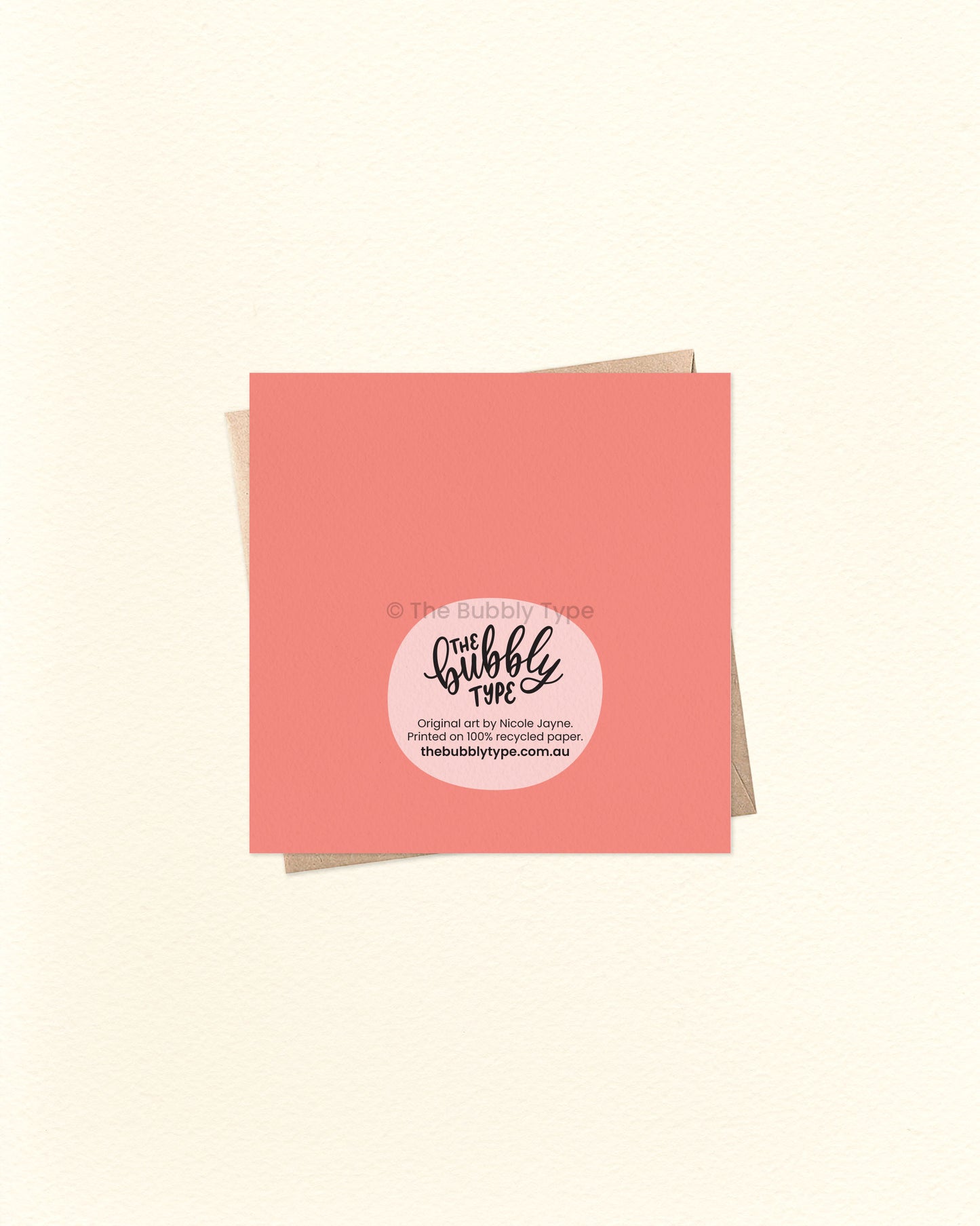 Back of the card with a vibrant peach-pink background, featuring The Bubbly Type logo and print details. Printed sustainably in Australia. Shown with a kraft brown envelope.