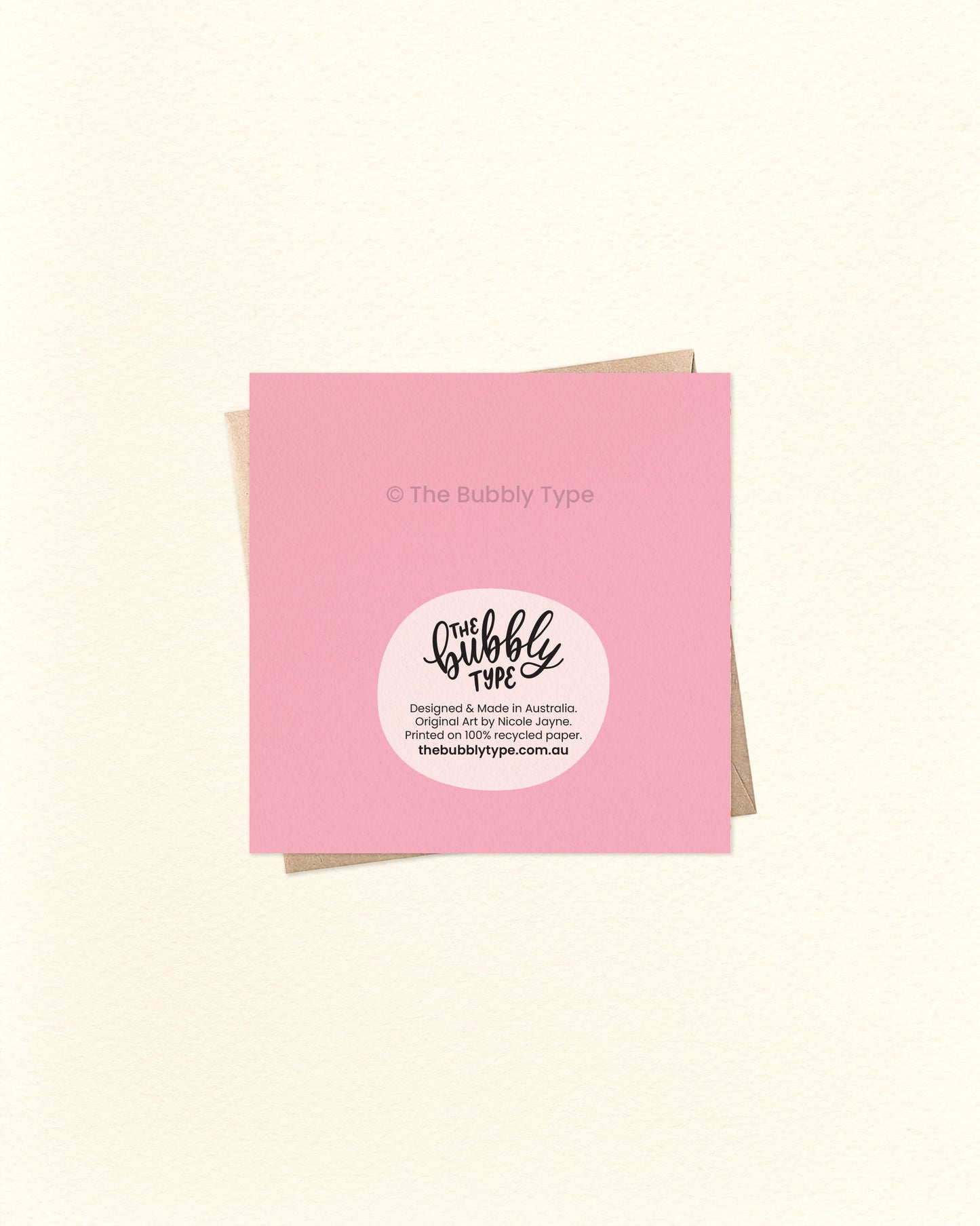 Back of the thank you card with pink background, displaying The Bubbly Type logo and print details. Printed in Australia on eco-friendly cardstock. Shown over a kraft brown envelope.