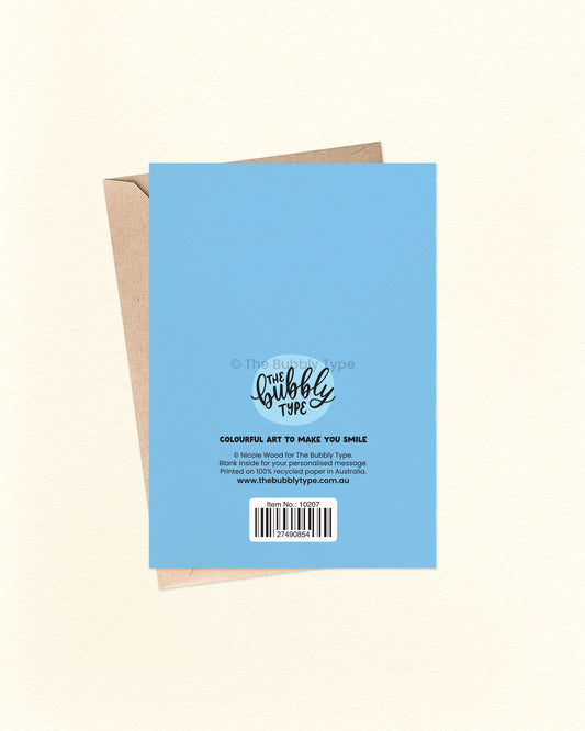 Back of the card with a matching blue background, featuring The Bubbly Type logo and card details. Displayed with a kraft brown envelope. Sustainably designed and printed in Australia.