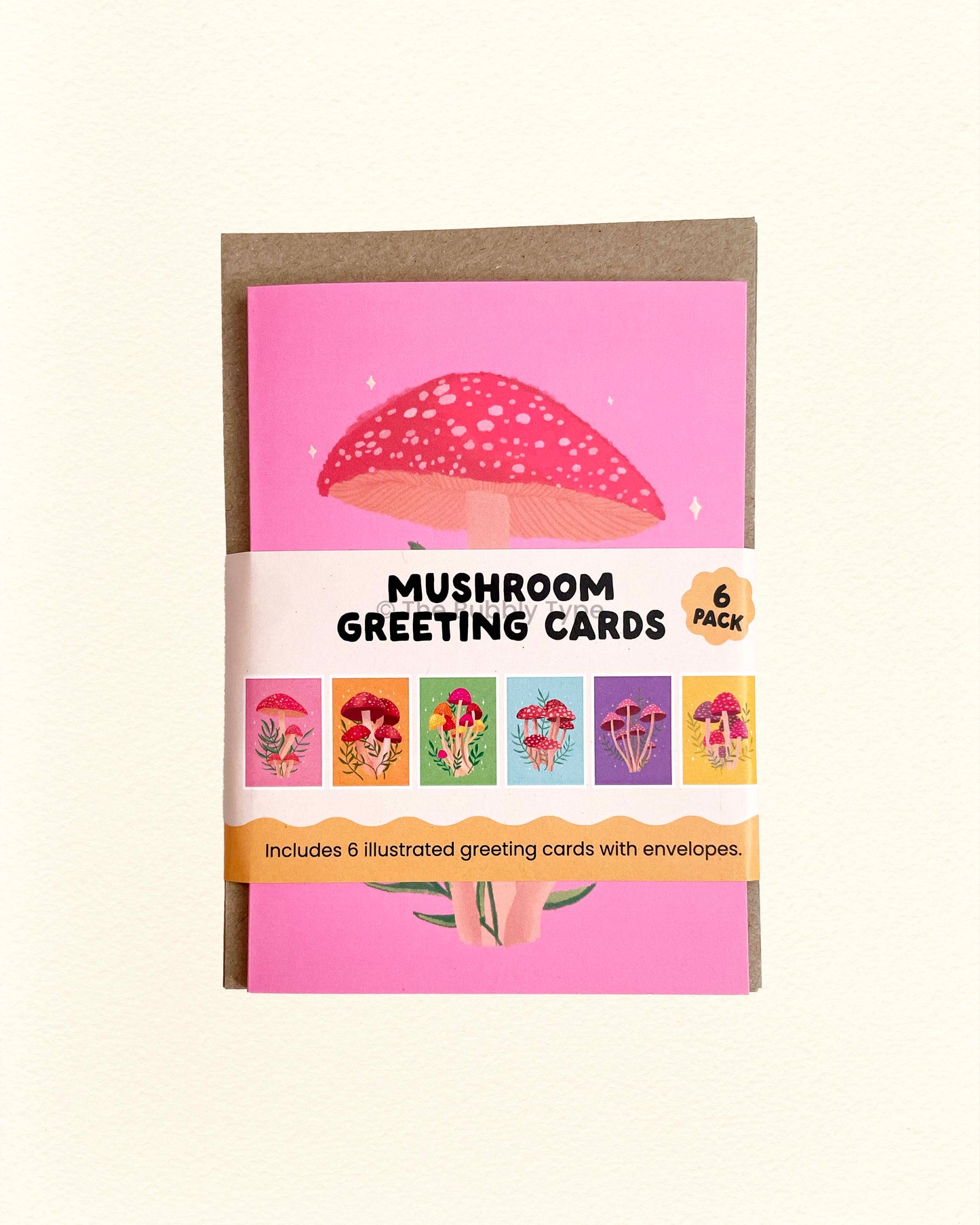 Front of The Bubbly Type mushroom card bundle showing six whimsical mushroom-themed greeting card designs, colourful Australian made stationery set.