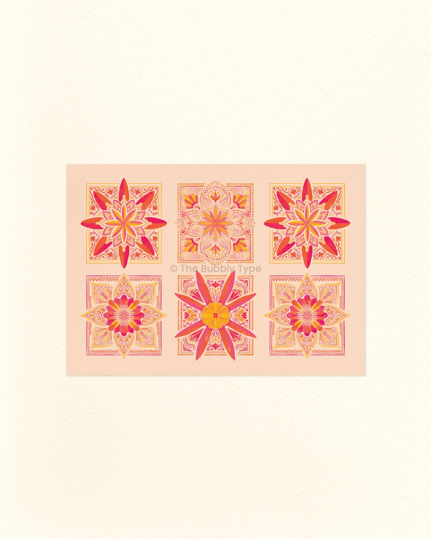 An A6 postcard featuring six floral pattern tile designs on a pale orange background