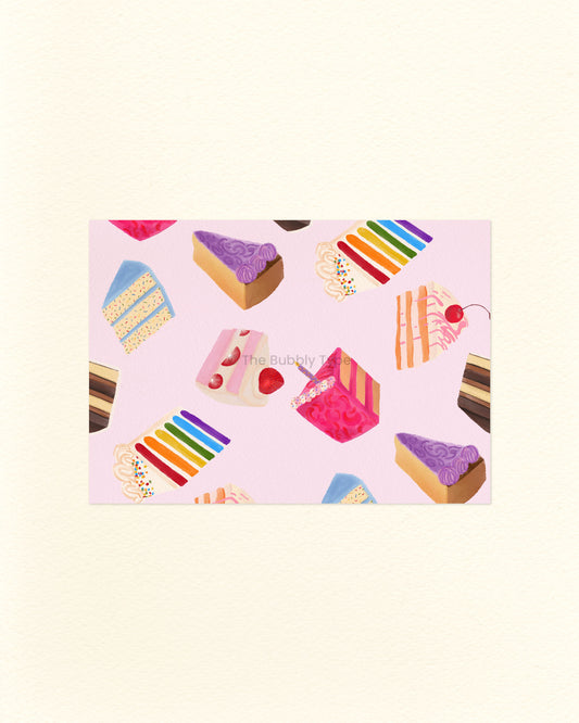 A postcard featuring a colourful cake pattern on a pink background.
