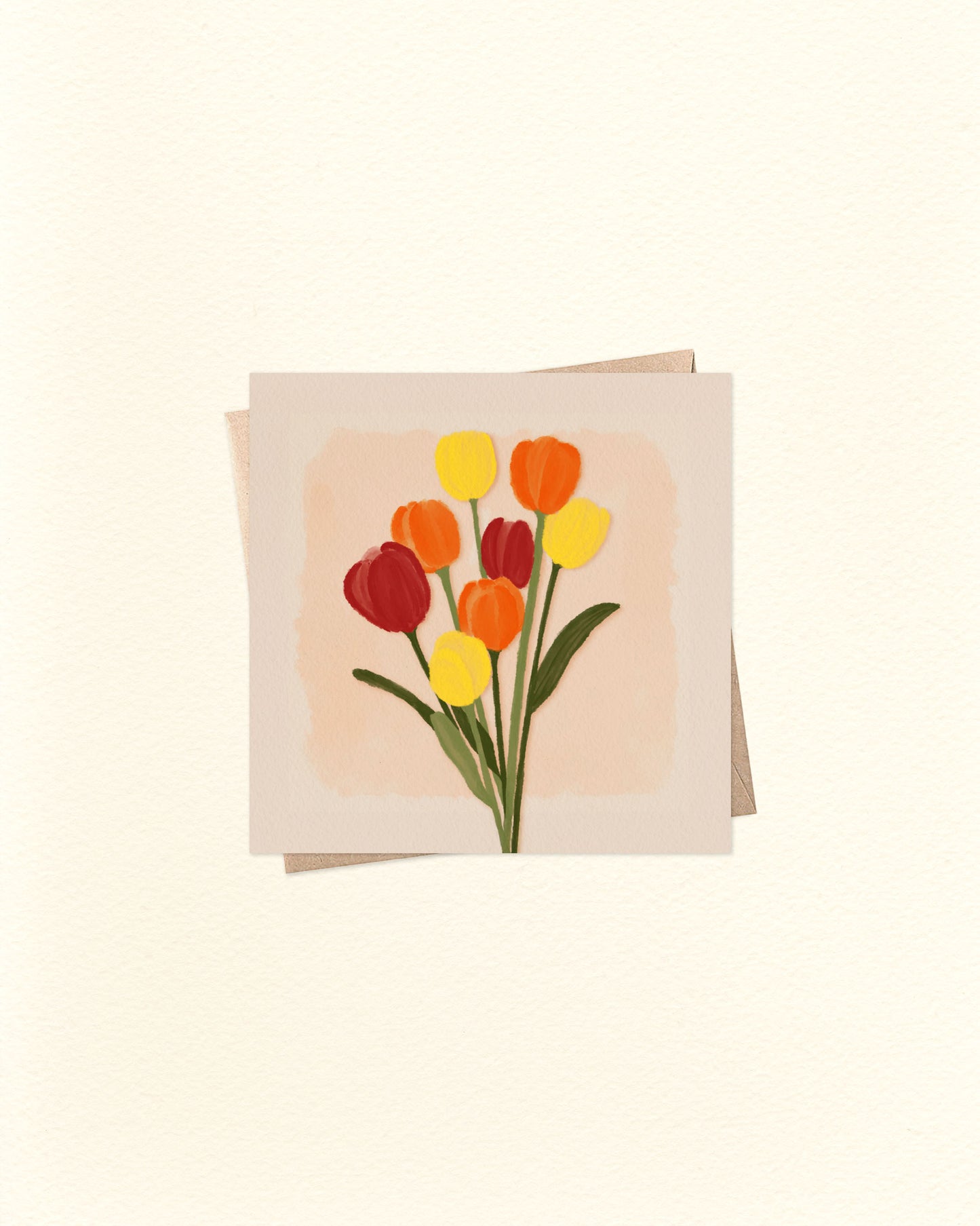 Greeting card with a design of red, yellow, and orange tulips on a beige background