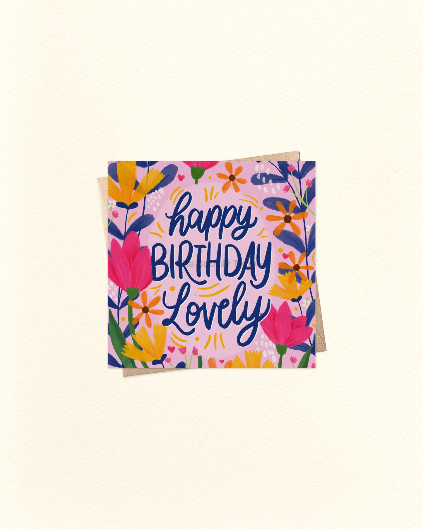 Birthday card with floral design and 'Happy Birthday Lovely' text on a light beige background