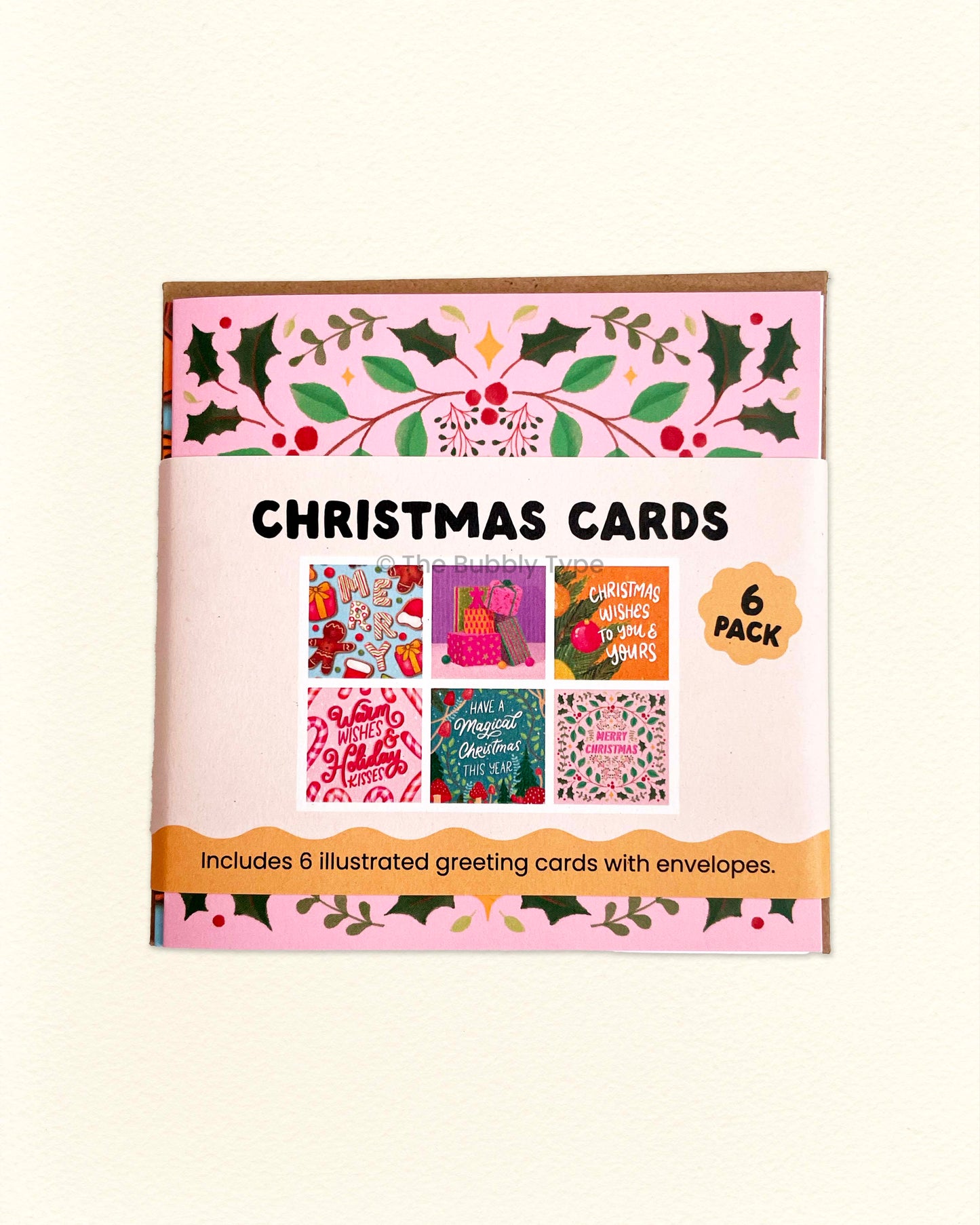 Front of The Bubbly Type square Christmas card pack, featuring 6 festive designs with bright colours and playful holiday illustrations, Australian made greeting cards.