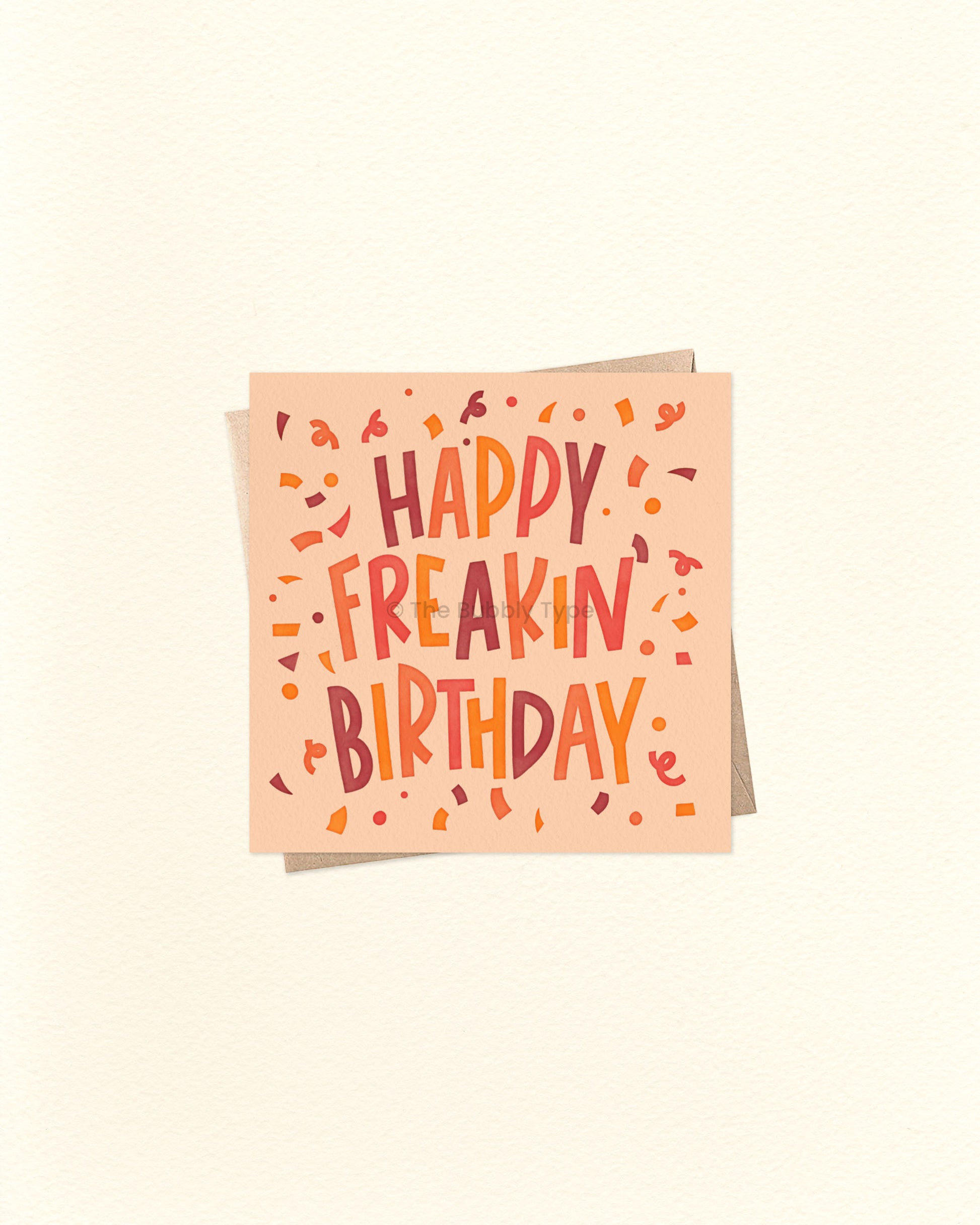Front of 10cm square birthday card with bold, hand-lettered text that reads “Happy Freakin’ Birthday,” surrounded by colourful confetti. Features bright, warm colours – perfect for celebrating boys, men, or anyone with a fun sense of humour. Paired with a brown kraft envelope. Australian made card by The Bubbly Type.