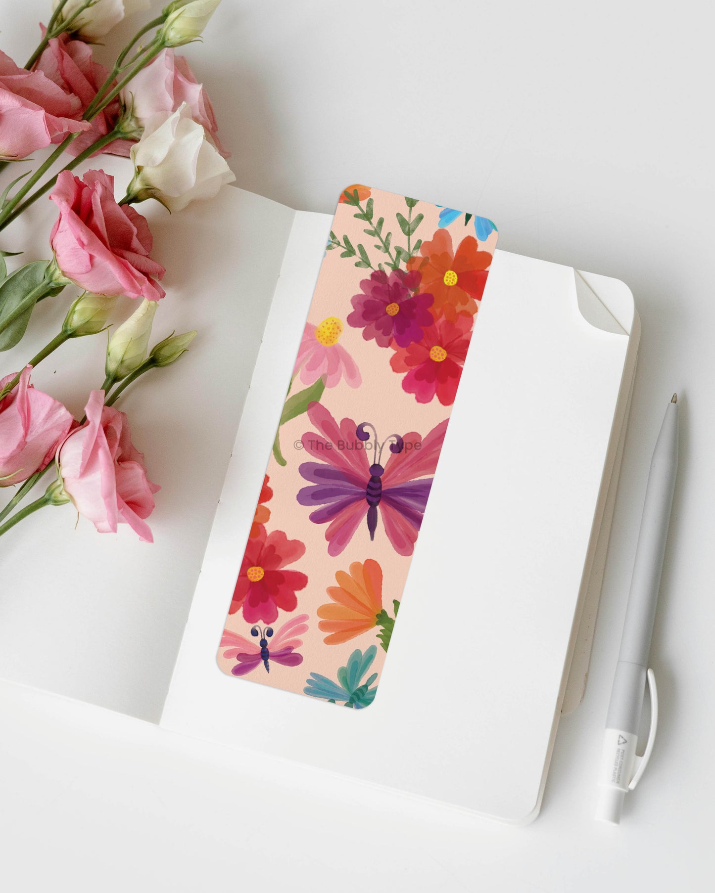 Whimsical Watercolour Butterfly Bookmark – Escape into nature with this butterfly and floral-themed bookmark, featuring a hand-painted watercolour design in bright pastels. This double-sided bookmark is made from 100% recycled paper, printed in Australia with an eco-conscious approach. With rounded corners for a smooth, elegant feel, it’s the perfect blend of delicate beauty and practicality. A must-have for lovers of butterflies, botanical art, and dreamy garden vibes!