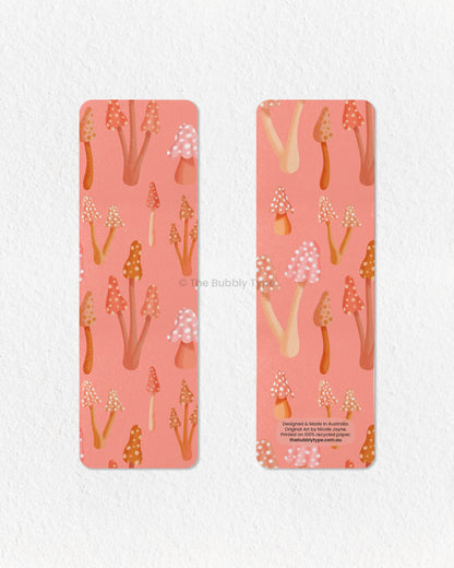 Warm & Earthy Mushroom Bookmark – Bring a touch of nature to your reading with this hand-illustrated mushroom bookmark! Featuring a neutral, warm-toned color palette of soft browns, beiges, and muted oranges, this botanical-inspired bookmark is perfect for nature lovers and cozy bookworms. Printed on 100% recycled paper, it’s double-sided, high-quality, and finished with rounded corners for a polished look. A must-have for fans of forest aesthetics, cottagecore, and whimsical woodland vibes! 🍂🍄📖