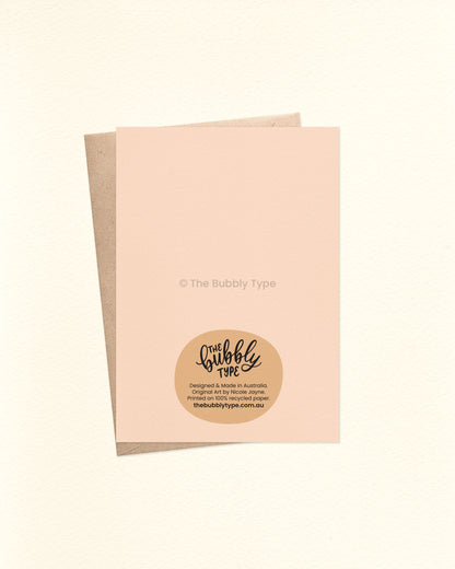 The back of the A6 card shows a soft creamy pink background with The Bubbly Type logo and card details, including “Printed in Australia on 100% Recycled Papers,” “Made and Designed in Australia,” and “Original Artworks by Nicole Jayne.”