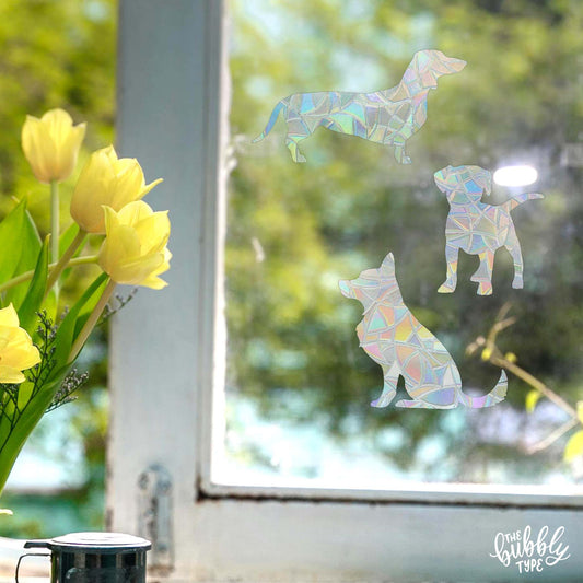 dog sticker, dogs sun catcher window cling that makes rainbows when the sun shines through. made in australia.
