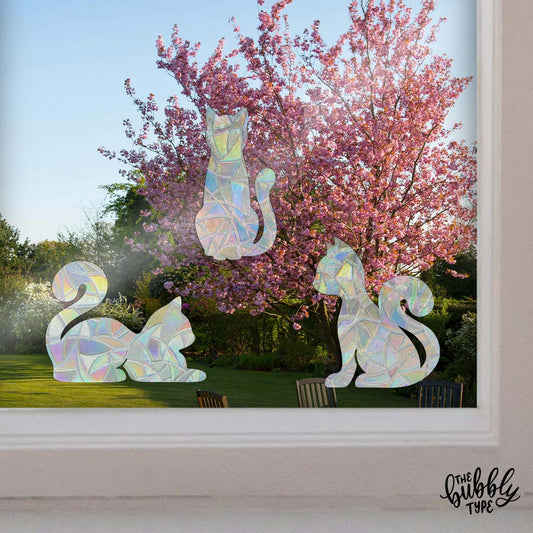kitty cat decoration for the window. rainbow making sun catcher stickers in cat shapes are a great gift for cat parents, cat mum, cat dad gifts.