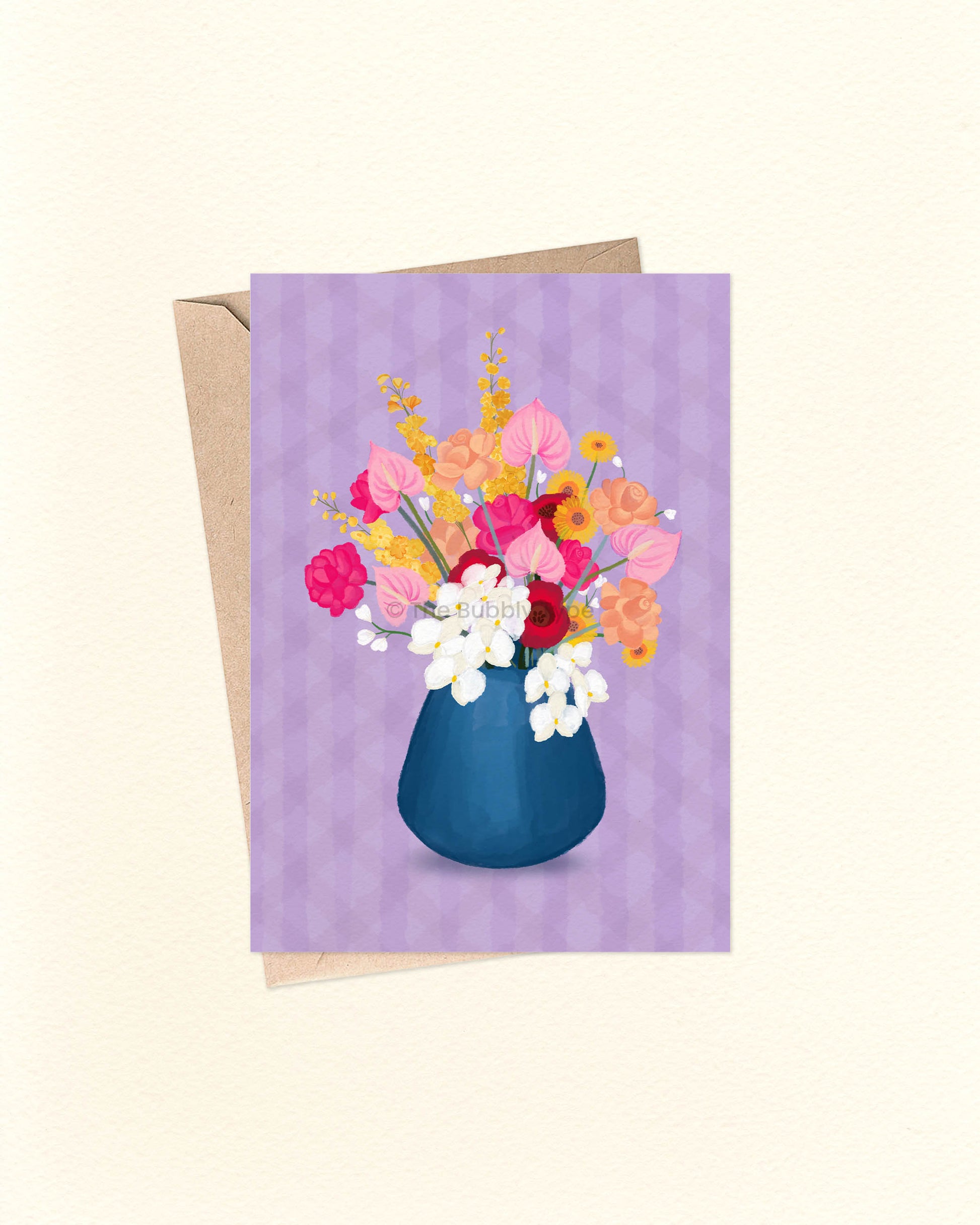 A delicate and elegant design featuring a rounded navy vase filled with colourful floral blooms, all set against a soft lavender background. A beautiful choice for any occasion—whether it's a birthday, a thank-you, or just because. This card is blank inside, giving you plenty of space to write your own heartfelt message. Featuring an original design by an Australian artist, it’s proudly 100% made and designed in Australia. Printed on thick 300gsm card stock made from 100% post-consumer recycled paper.