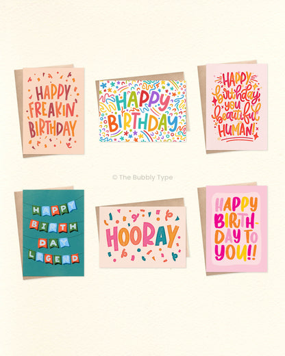 Birthday Greeting Card Pack – Set of 6 A6 Handmade Cards

Make every birthday extra special with this pack of 6 vibrant A6 greeting cards, featuring fun and unique designs by Nicole Jayne. With a mix of bold lettering, playful illustrations, and bright colours, this set has the perfect card for every personality.

This pack includes one of each design:
Happy Freakin’ Birthday – A fun, confetti-filled design to celebrate in style.
Happy Birthday – A lively design with rainbow squiggles for a burst of colour.