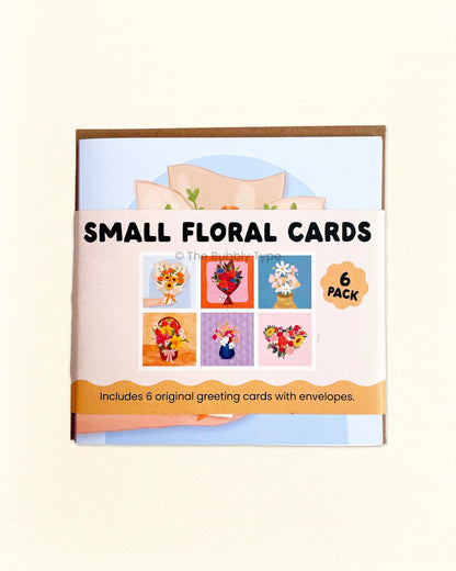 Front of The Bubbly Type small floral card pack showing colourful square greeting cards with fun flower designs, Australian made eco-friendly stationery set of 6.