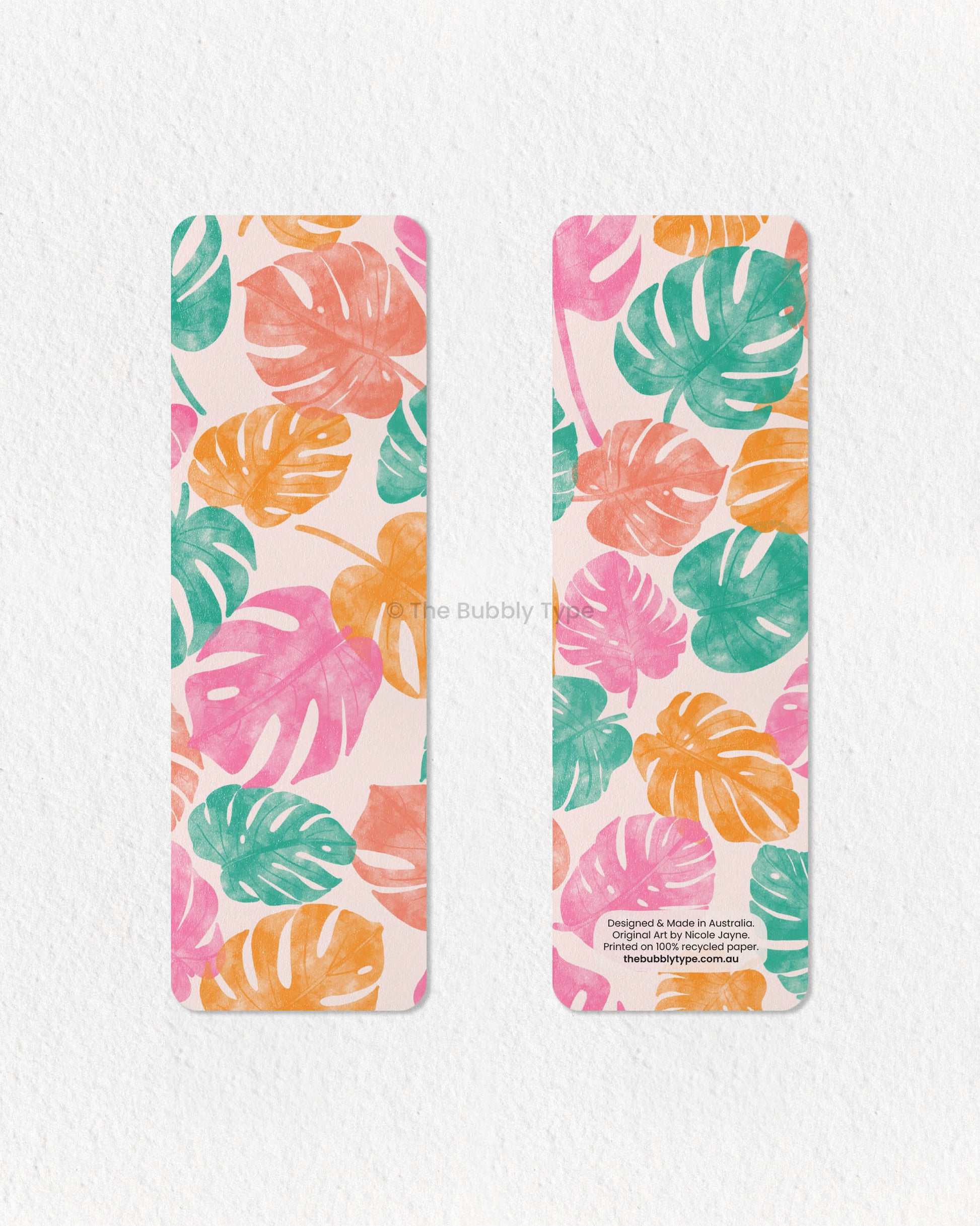 Bright and Tropical Monstera Leaf Bookmark – Add a splash of paradise to your reading with this vibrant monstera leaf bookmark! Featuring a lush tropical pattern in shades of pink, yellow, orange, and green, this colorful botanical bookmark is perfect for plant lovers and bookworms alike. Printed on eco-friendly, 100% recycled paper, it’s double-sided, high-quality, and finished with rounded corners for a sleek look. Keep your place in style with this tropical leaf print bookmark, inspired by the beauty of 