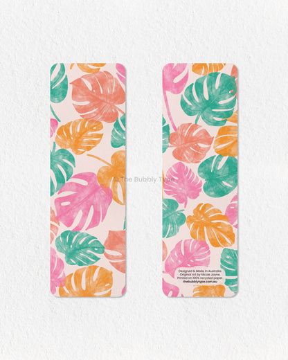 Bright and Tropical Monstera Leaf Bookmark – Add a splash of paradise to your reading with this vibrant monstera leaf bookmark! Featuring a lush tropical pattern in shades of pink, yellow, orange, and green, this colorful botanical bookmark is perfect for plant lovers and bookworms alike. Printed on eco-friendly, 100% recycled paper, it’s double-sided, high-quality, and finished with rounded corners for a sleek look. Keep your place in style with this tropical leaf print bookmark, inspired by the beauty of 