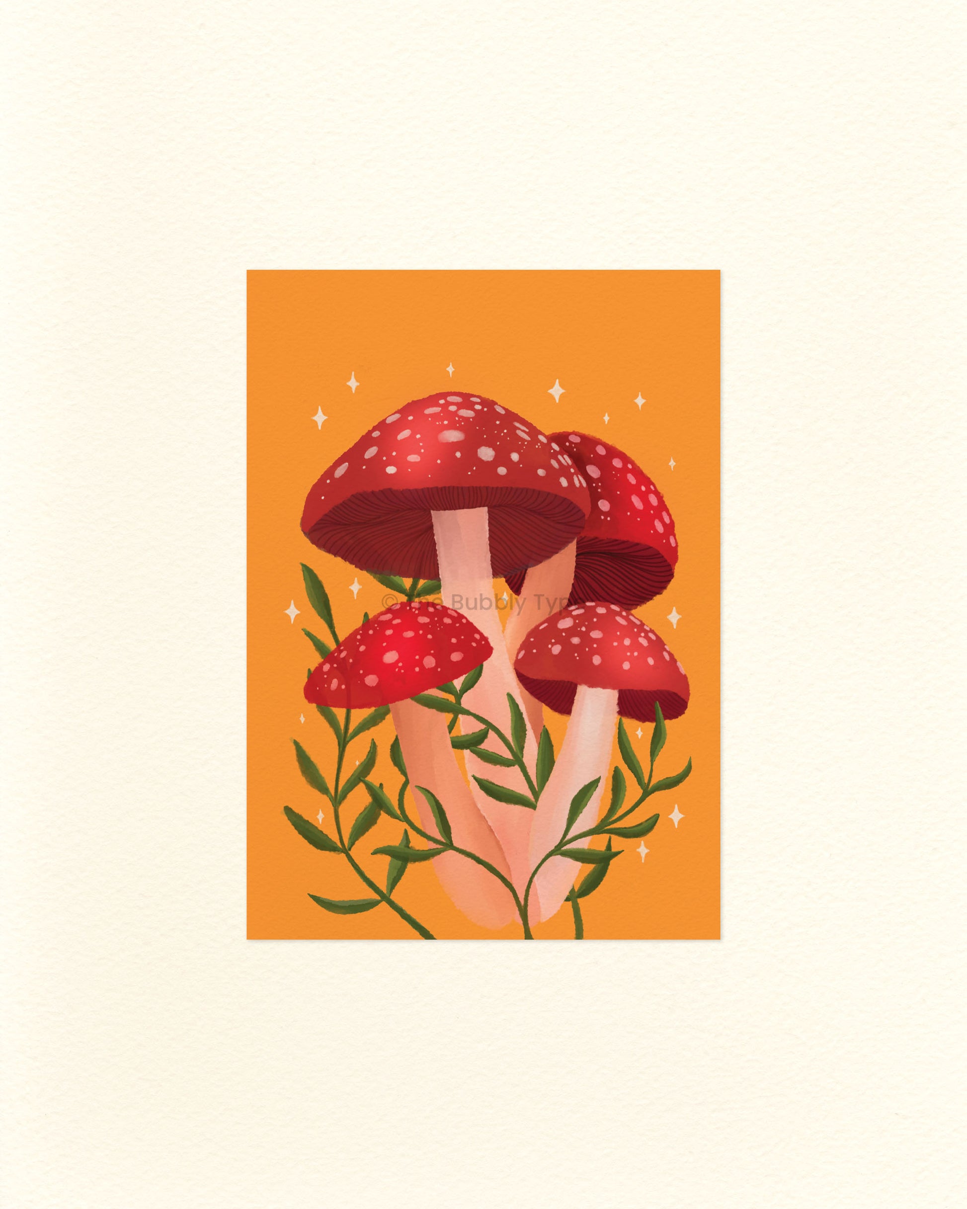 An A6 Postcard featuring an illustration of red capped mushrooms with green stems and leaves on an orange background