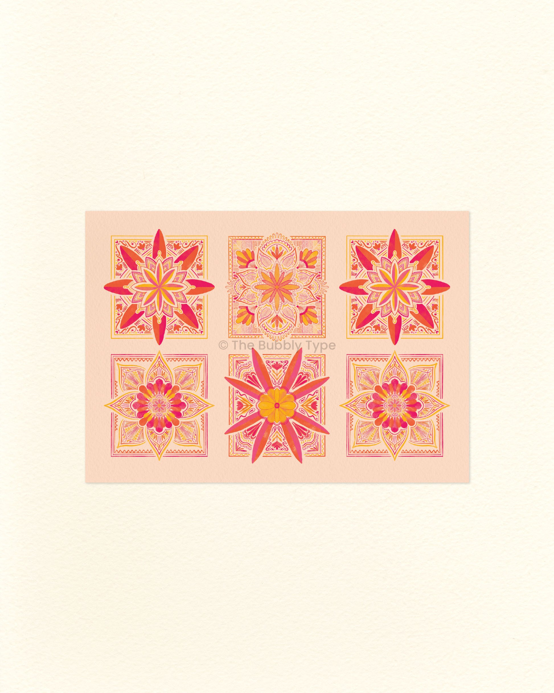 An A6 postcard featuring six floral pattern tile designs on a pale orange background
