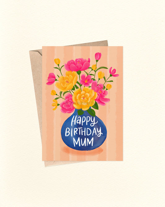 Greeting card with floral design and 'Happy Birthday Mum' text on a peach background