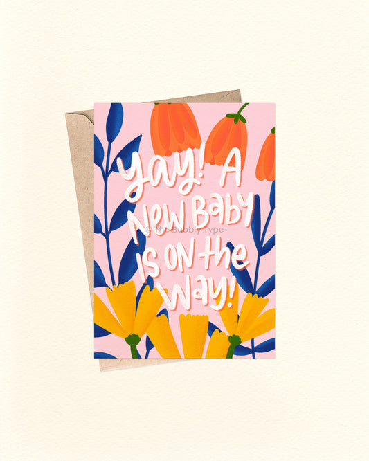 Greeting card with floral design and text on a pink background