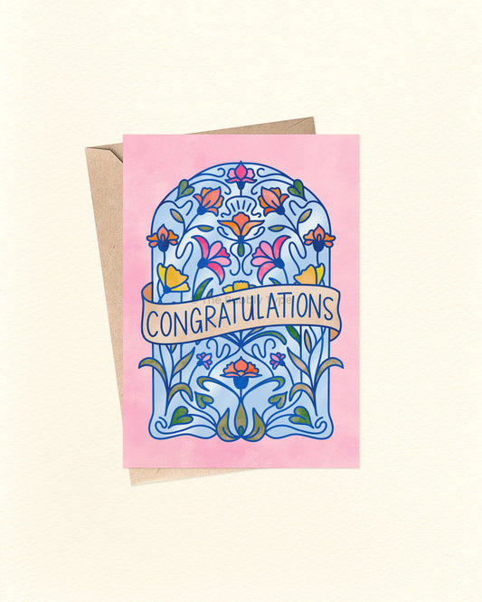 Greeting card with floral design and 'Congratulations' text on a pink background