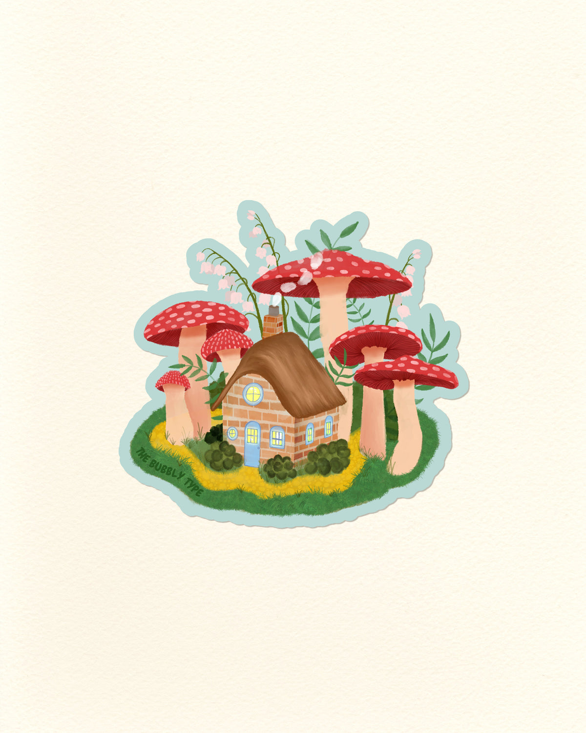 A whimsical illustrated vinyl sticker featuring a small brick house surrounded by oversized red-and-white mushrooms, green foliage, and a light blue outline, centred on a warm off-white background.