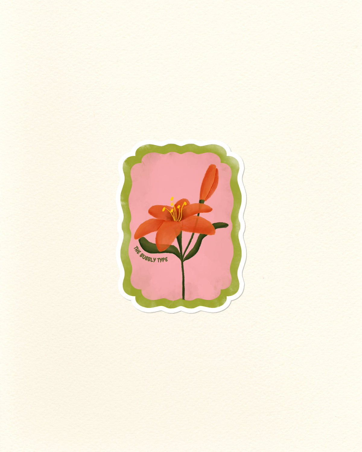 A die-cut postage stamp sticker featuring an orange lily flower on a pink background with a scalloped green border, shown on a textured off-white paper background.