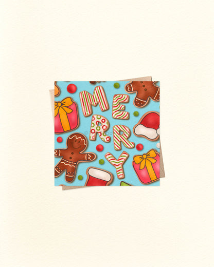 A blue square greeting card to celebrate Christmas. It has an illustration of gingerbread cookies in the shape of gingerbread men, presents, Santa hats and also spells the word "MERRY". 
