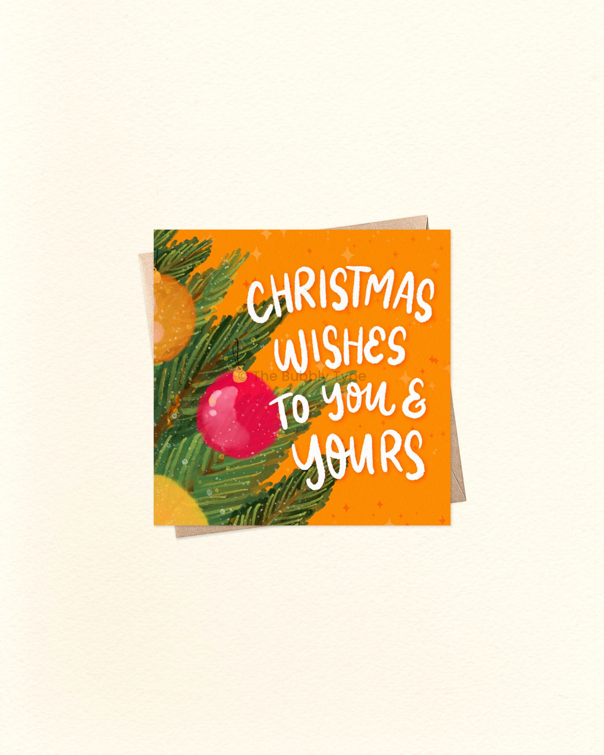 Square Christmas greeting card with festive message ‘Christmas Wishes to You and Yours’, displayed on a brown kraft envelope. Unique holiday card design, perfect to buy in Australia for friends and family.