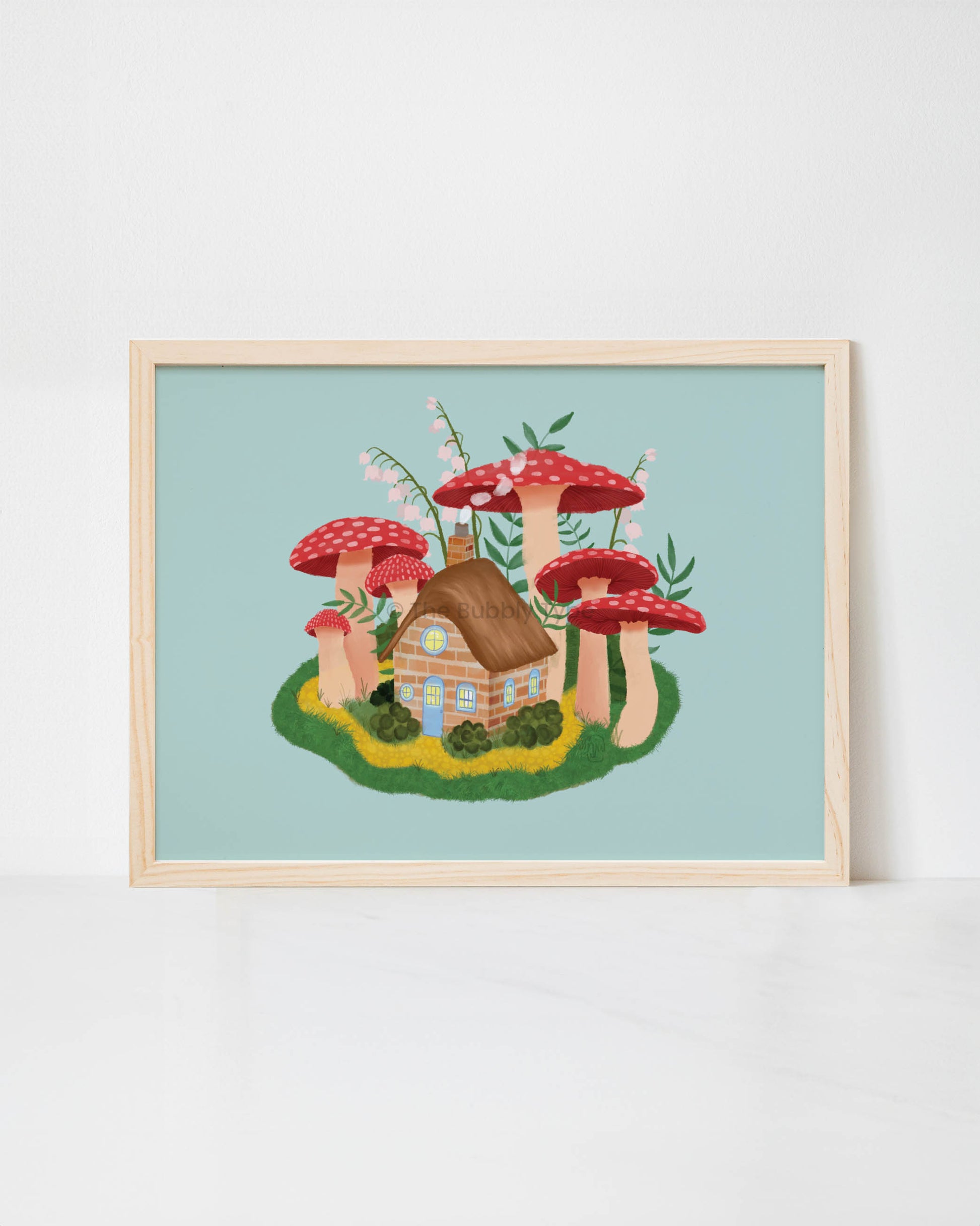Step into a storybook scene with this whimsical cottage art print, featuring an enchanting mushroom house nestled in a lush forest of lily of the valley flowers. This Australian-made art print is an original illustration, bringing a dreamy, nature-inspired charm to any space. Printed on 350gsm uncoated, 100% recycled paper, this eco-friendly wall art has a high-quality matte finish, enhancing its soft, magical details. Perfect for those who love cottagecore decor, fairy tale aesthetics, and botanical prints