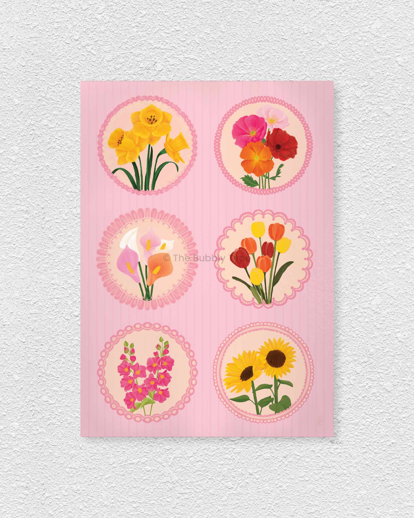 Art print of floral circle stamps with various flowers on a pink background