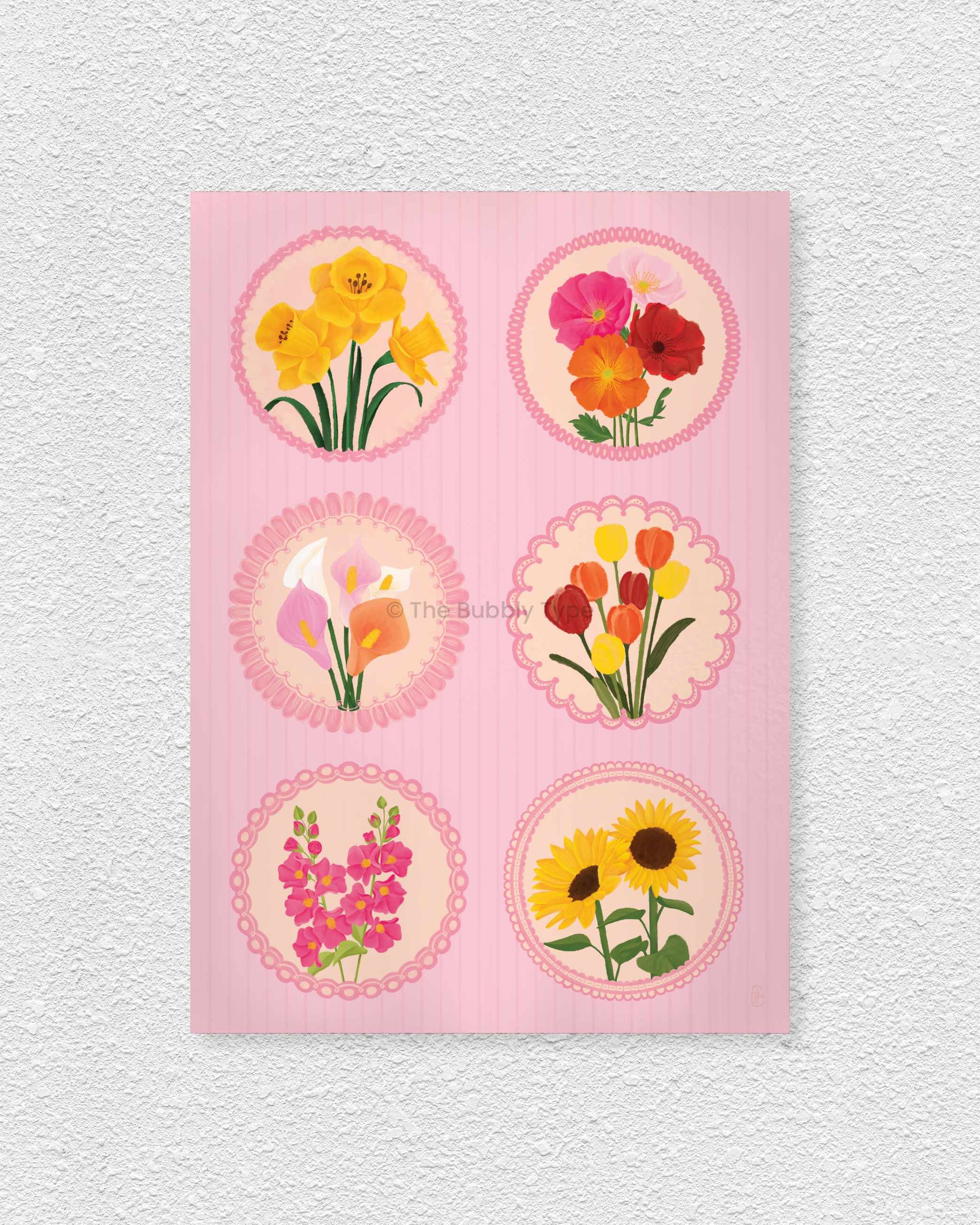 Art print of floral circle stamps with various flowers on a pink background